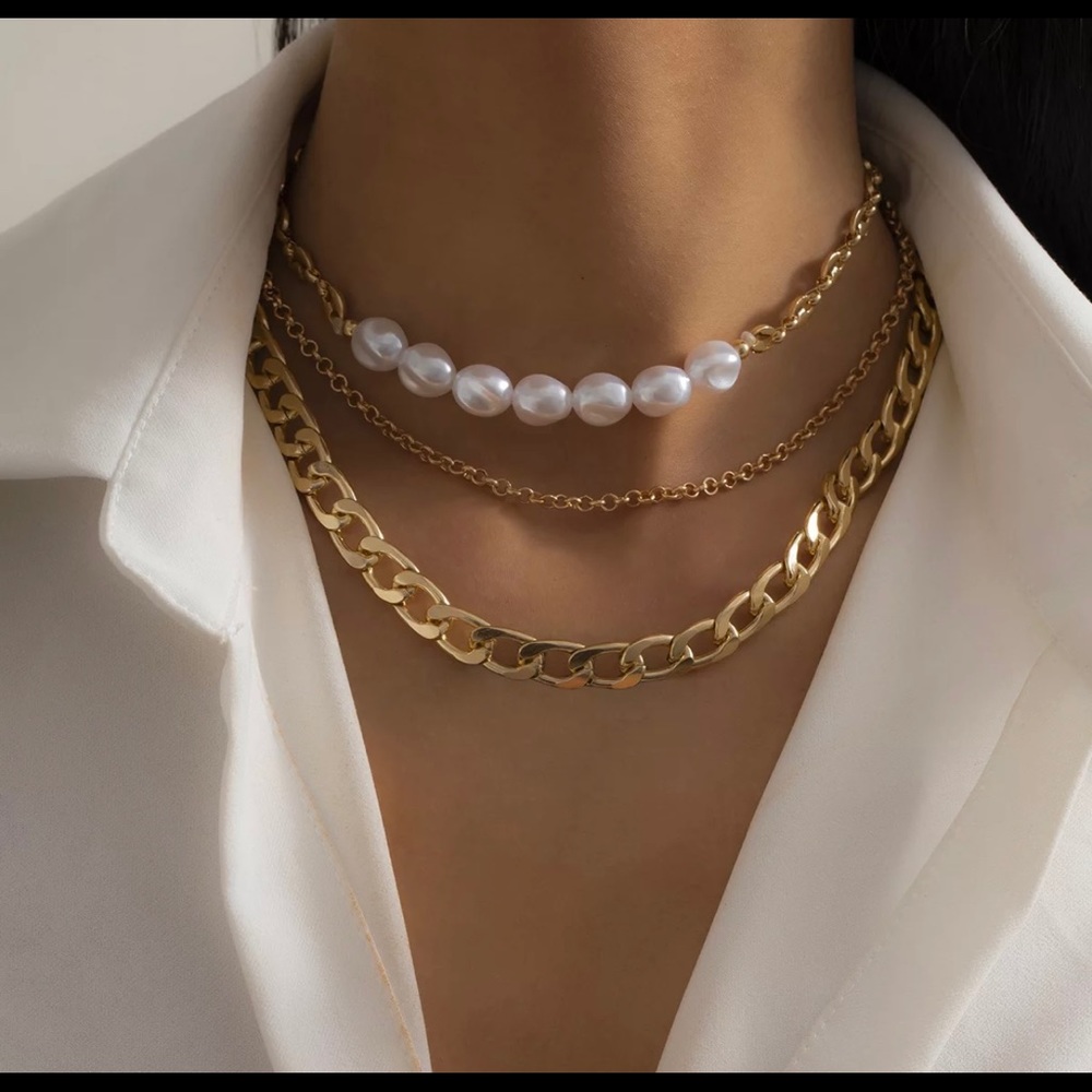 Layered gold necklace with fresh water pearls